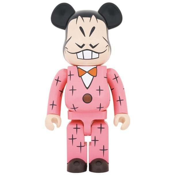 1000% Bearbrick Iyami figure from Osomatsu anime in pink suit with black cross patterns and orange bow tie